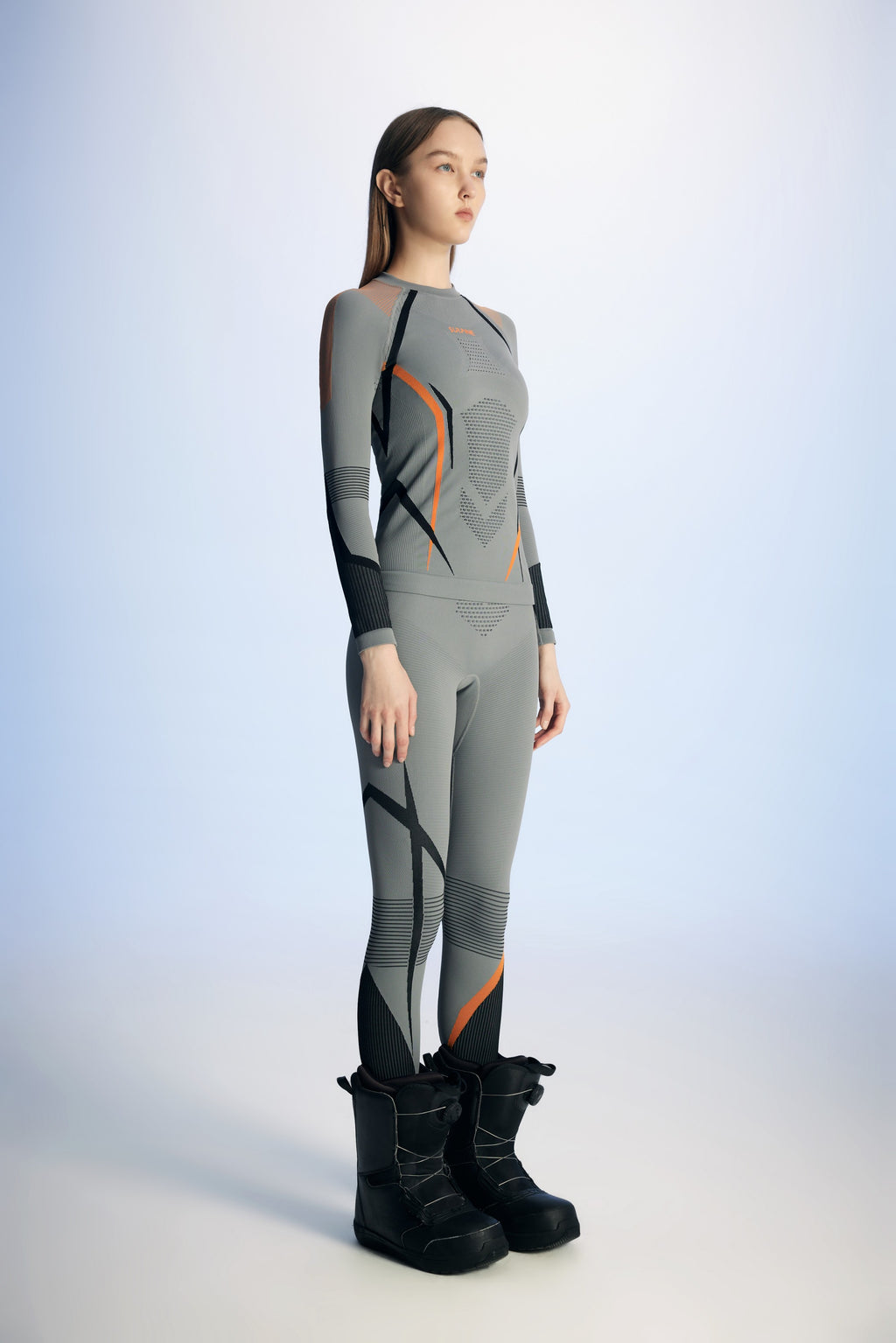 Surpine _ elite_thermal_compression_baselayer_women_black_orange_side
